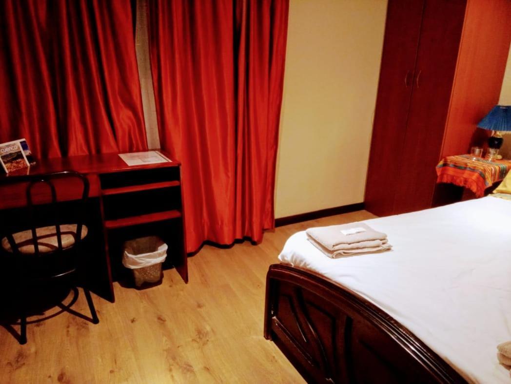 Casa De Huespedes Tu Parada En 昆卡 外观 照片
